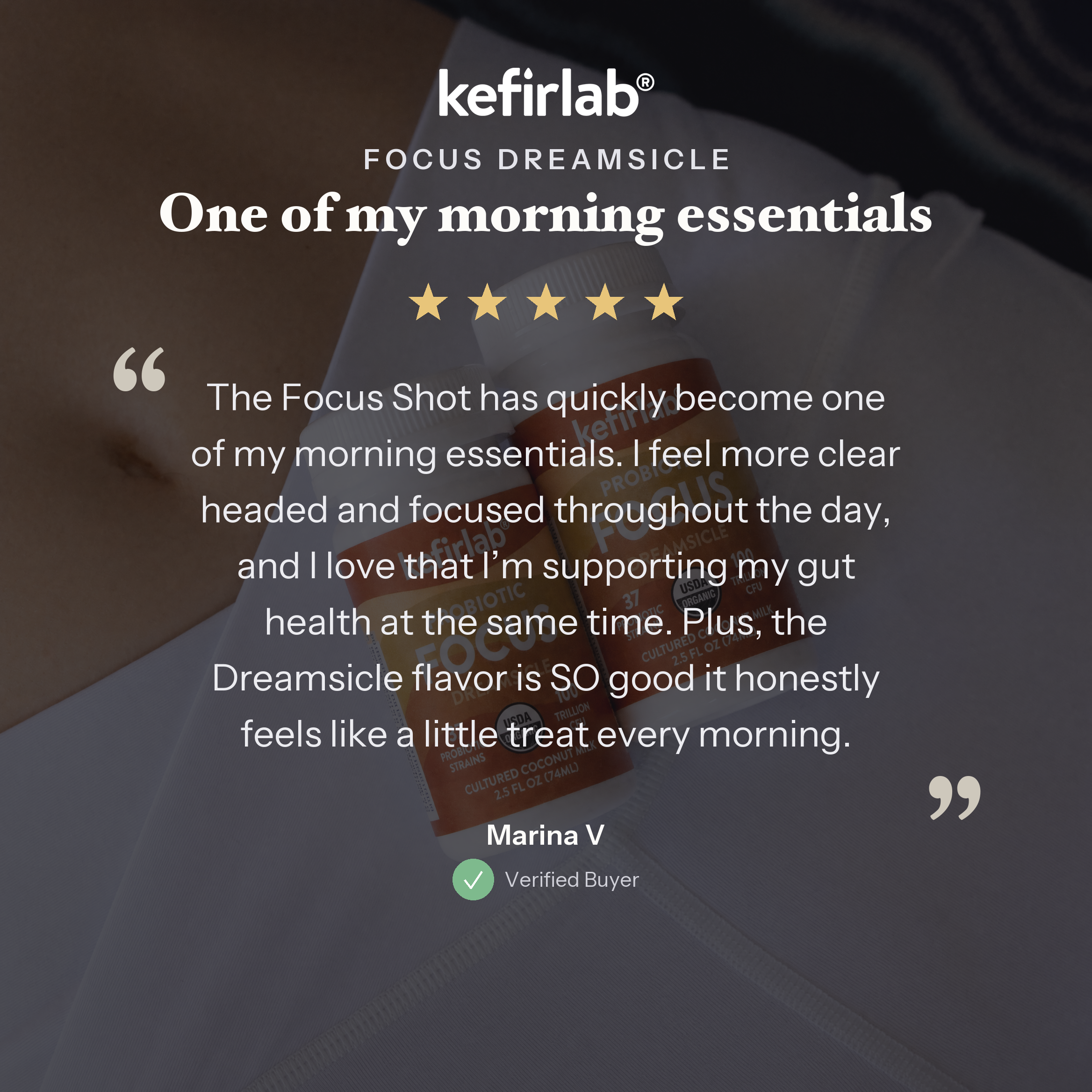 kefirlab Focus Dreamsicle probiotic shot bottles on fabric base, white caps