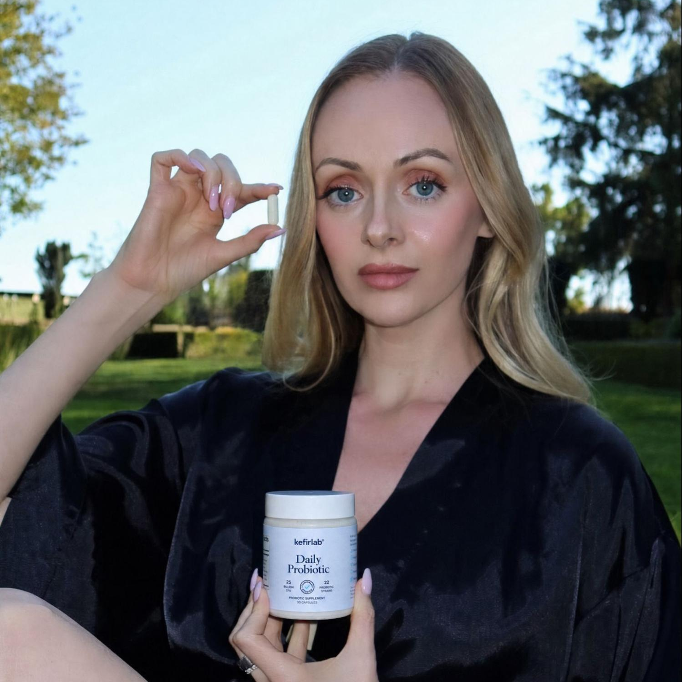 kefirlab Daily Probiotic capsule bottle shown at chest height