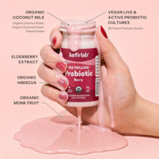 Kefirlab Berry Probiotic Shot bottle with pink liquid being poured.