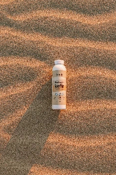 kefirlab coconut milk kefir vanilla bottle on sand, small size