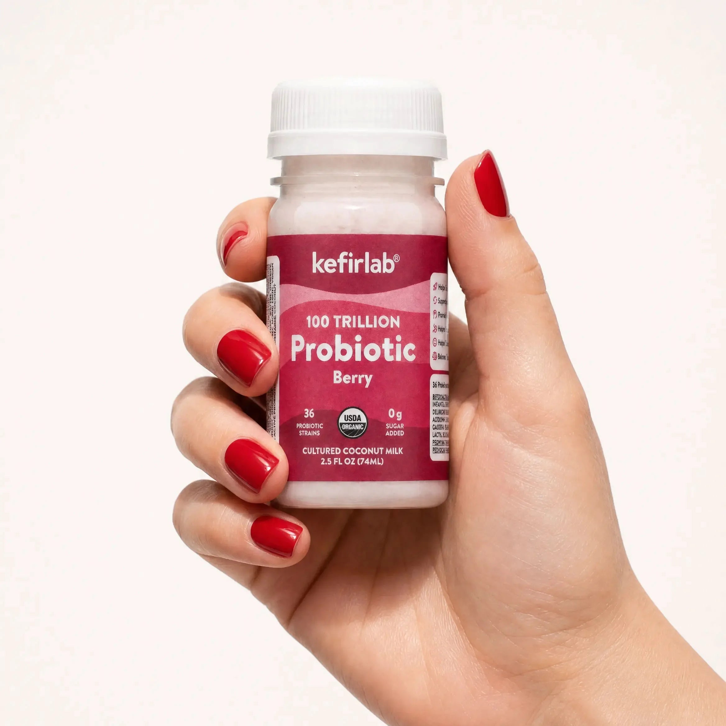 KefirLab probiotic berry shot bottle with white cap and red label