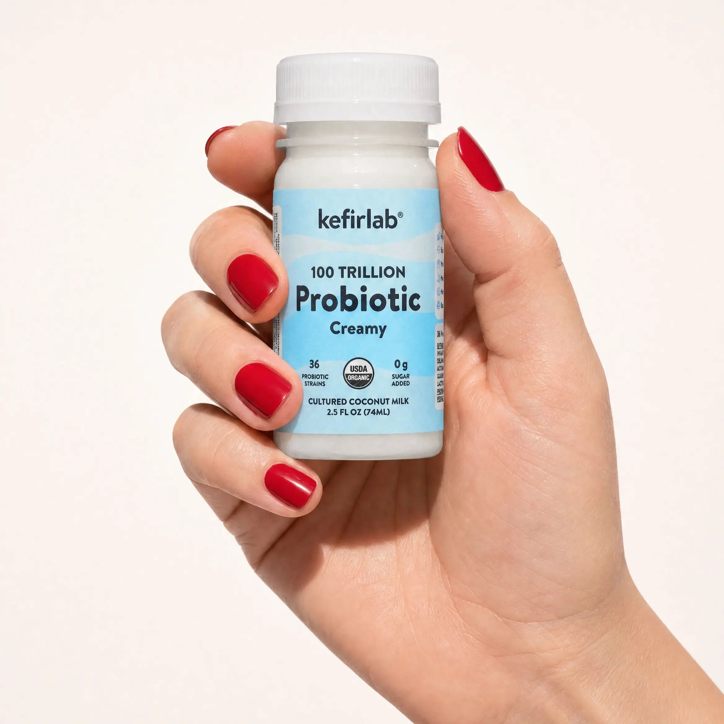 Creamy probiotic shot bottle with kefirlab label: 100 trillion probiotic, 2.5 fl oz